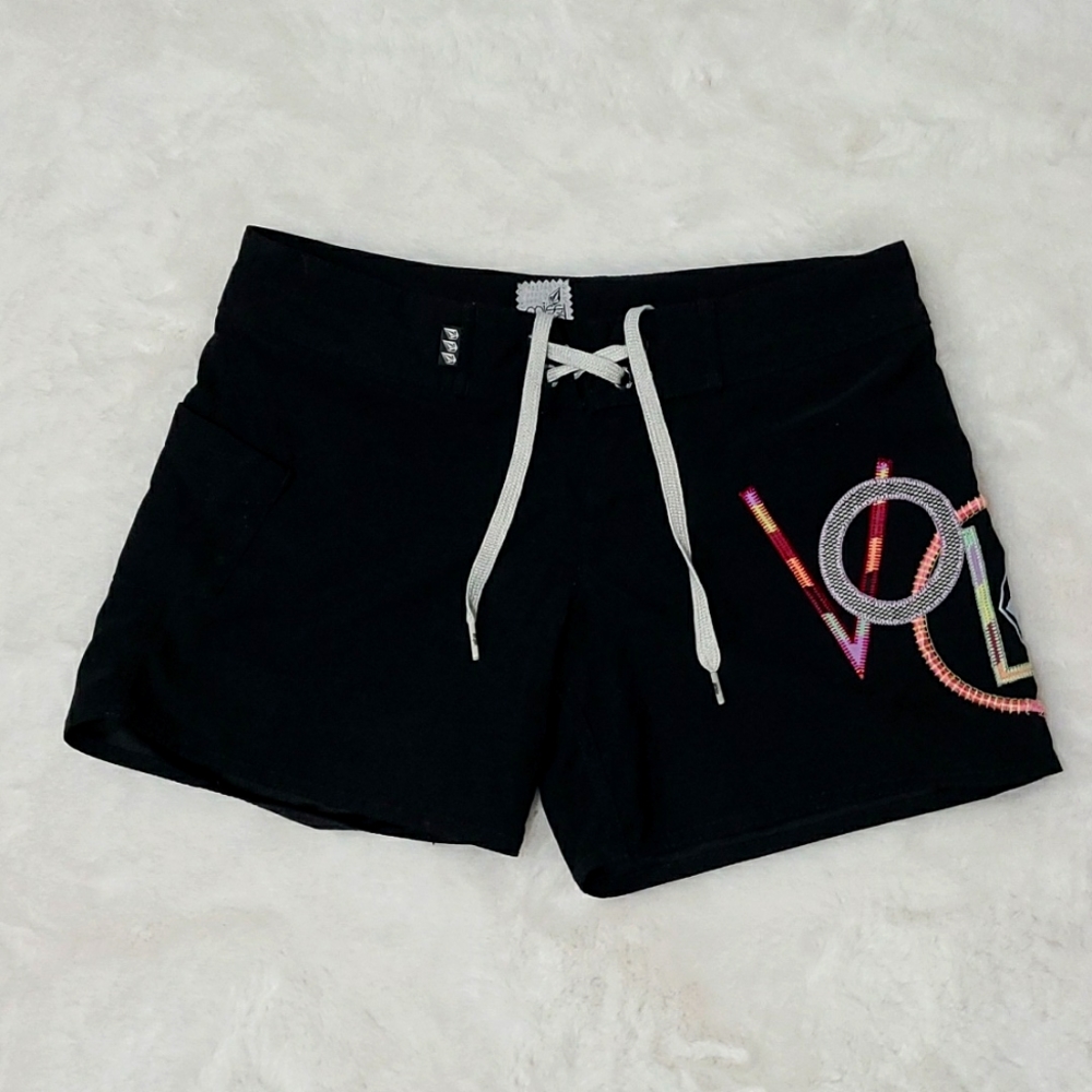 Volcom swim shorts and bikini top